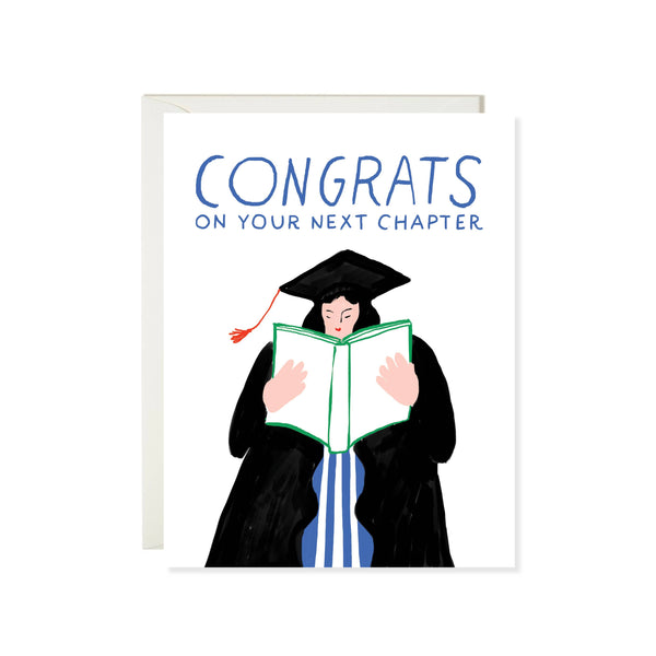 Graduation-themed card with a person in a cap and gown reading a book, and 'Congrats on Your Next Chapter' text.