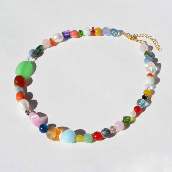 Colorful beaded necklace on a white background