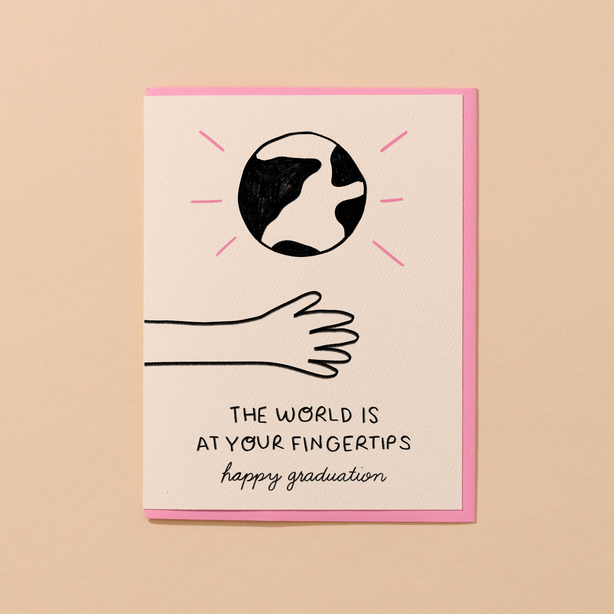 Graduation card with hand and world illustration on a beige background