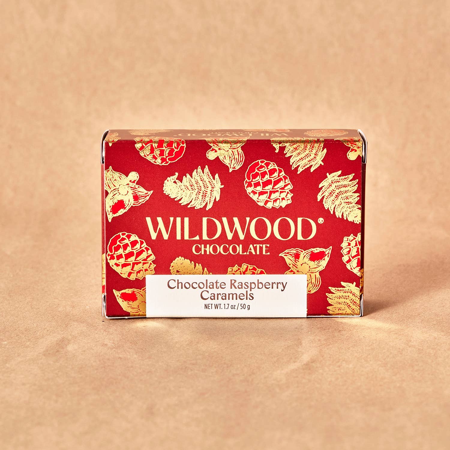 Box of Wildwood Chocolate on a beige background