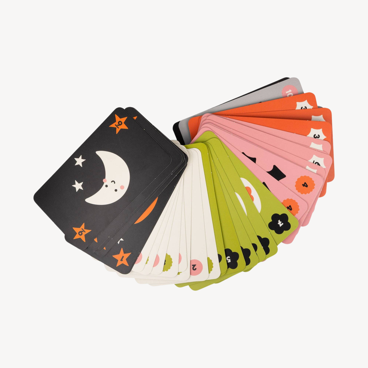 A fan of colorful children's cards on a plain white background, showing different illustrated faces and shapes in black, white, orange, pink, green, and gray.