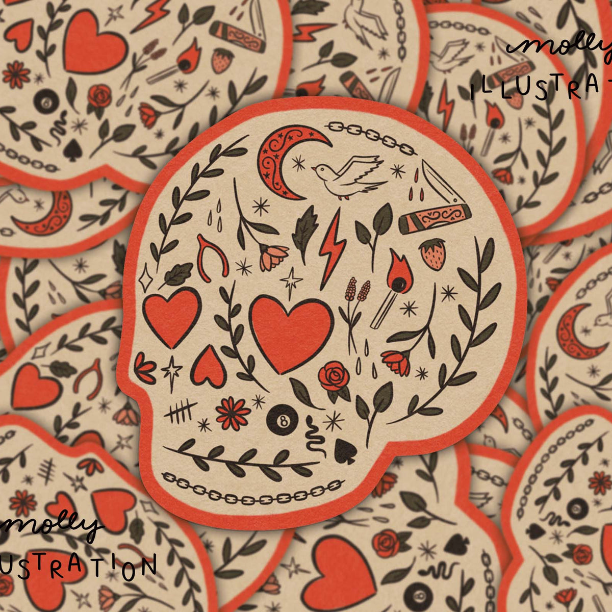 A close-up of multiple overlapping skull-shaped stickers or cards with a tattoo-style illustration. The central piece shows red hearts, black floral and line motifs, and a red border on a warm cream background.
