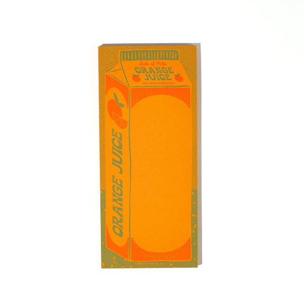 Notepad designed to look like an orange juice carton.