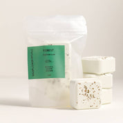 Packaged Wildflower Rituals Forest Rosemary & Fir shower steamers on a light background