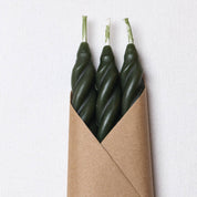 Set of three pine beeswax spiral taper candles from Cave Glow Studio, featuring natural beeswax with twisted spiral design.