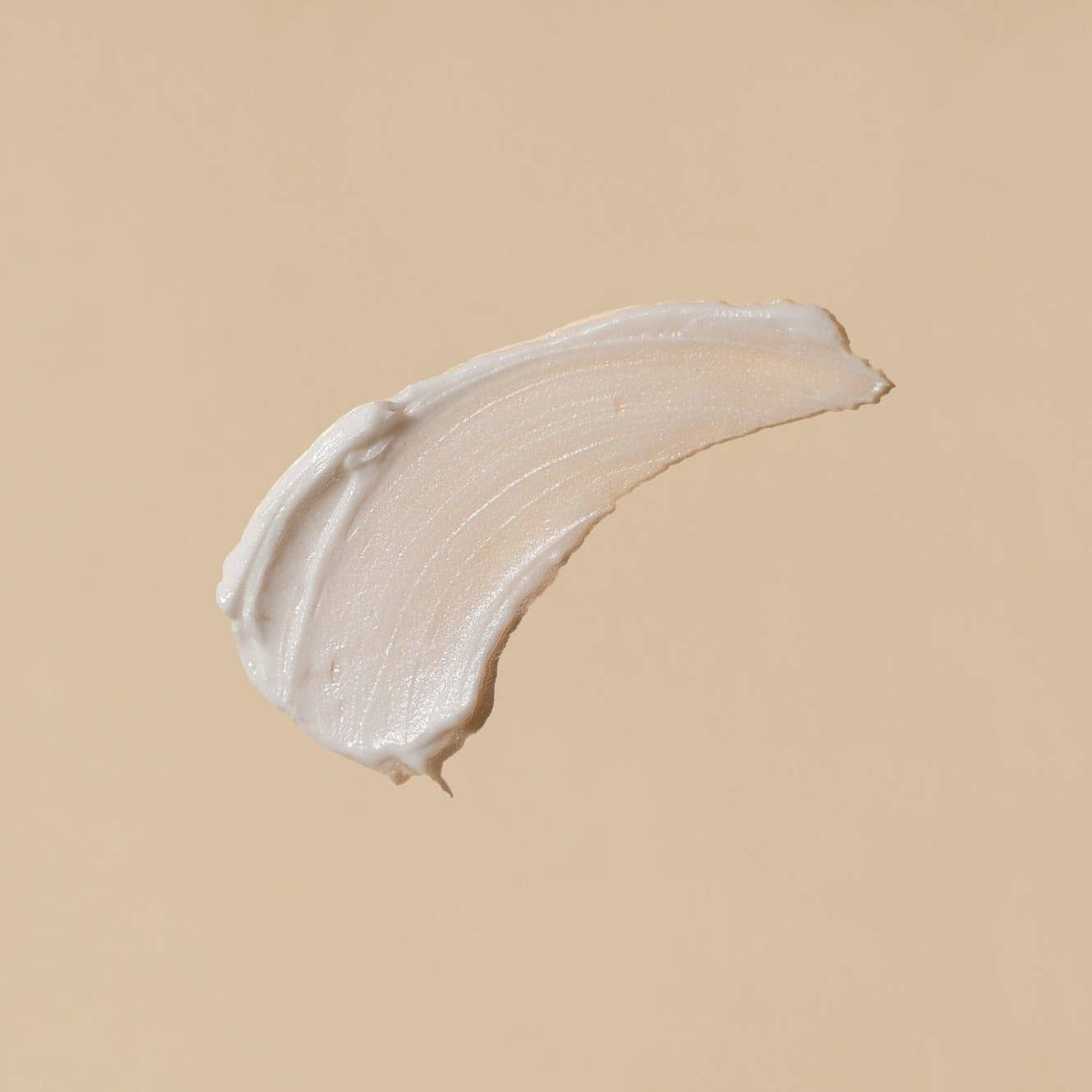 Beige cream swatch on a beige background