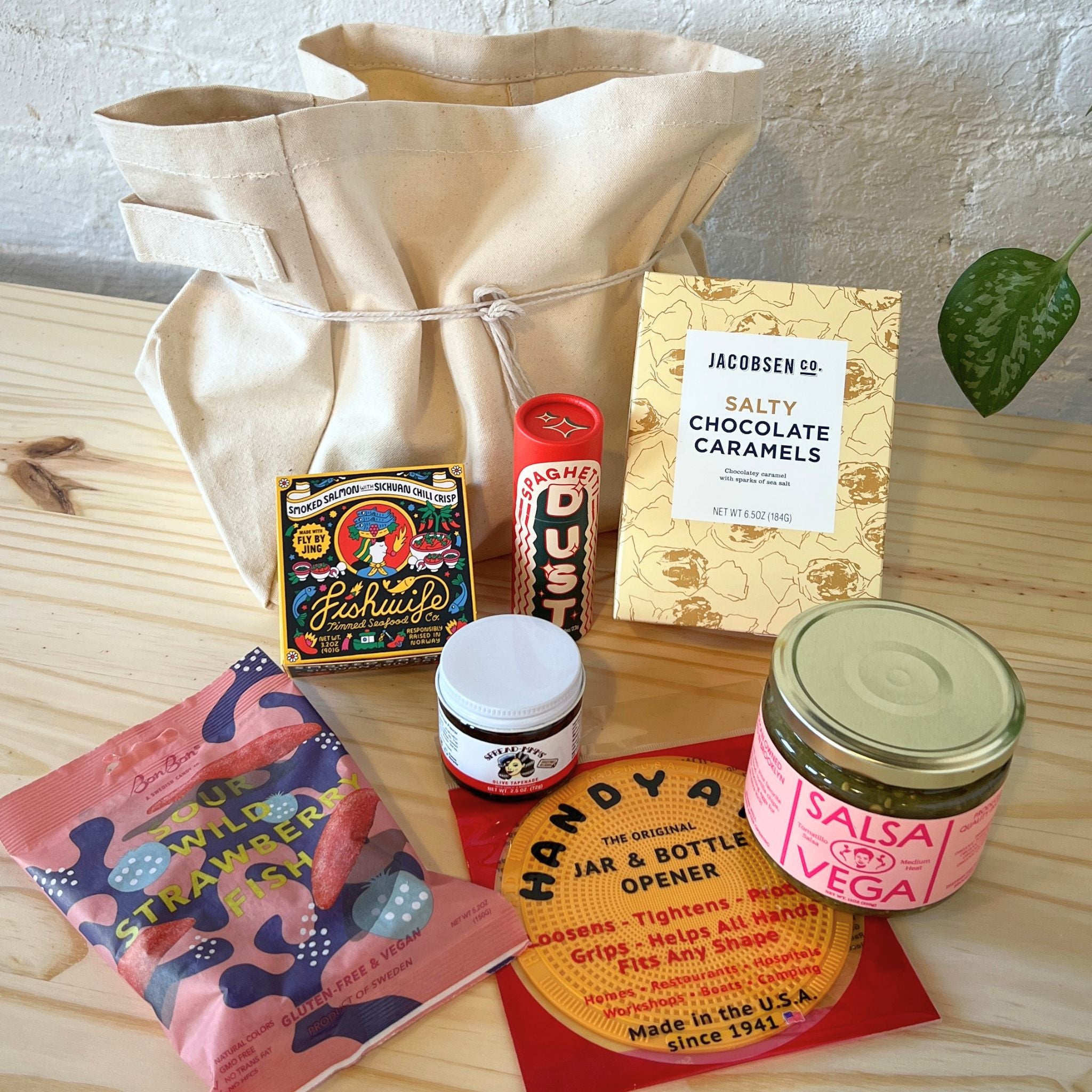 A collection of pantry items against a wooden background.