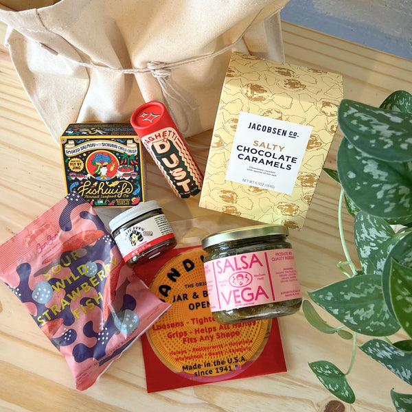 A collection of pantry items against a wooden background.