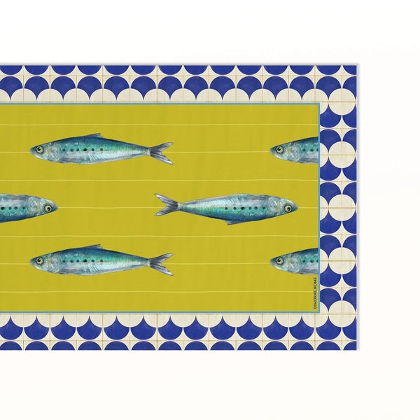 Patterned fabric with sardine design on a white background