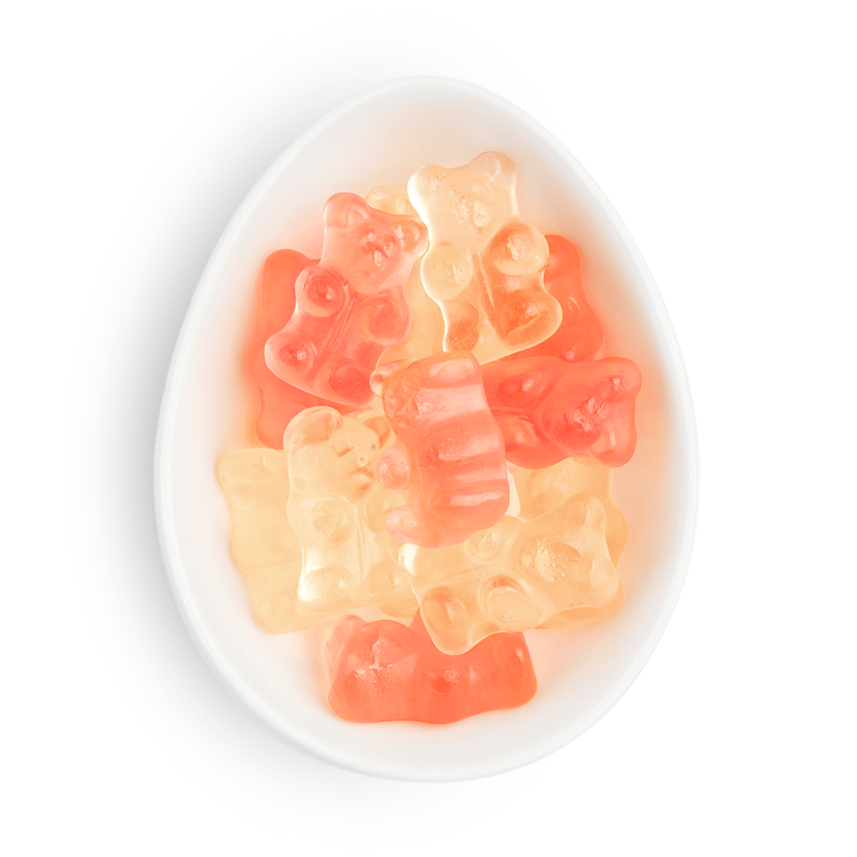 Gummy bears in pink and orange on a white plate with a white background