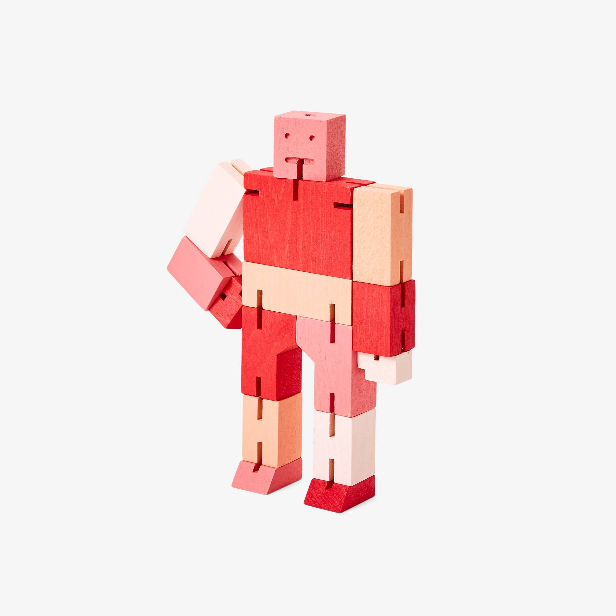 Red and beige robot-like figure made of interlocking bricks on a white background