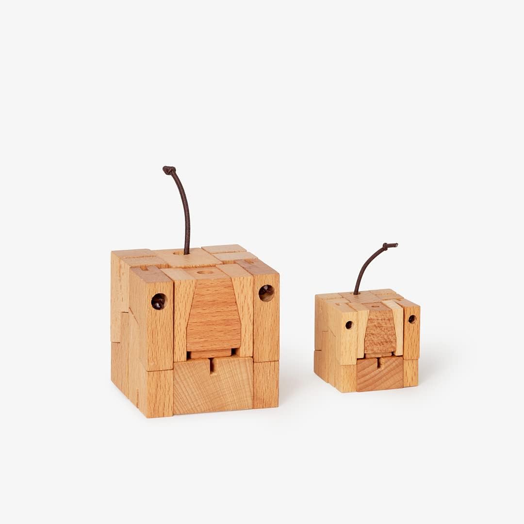 Two wooden puzzle toys shaped like elephants on a white background