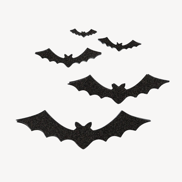 5 black glitter cut-out bats against a white background.