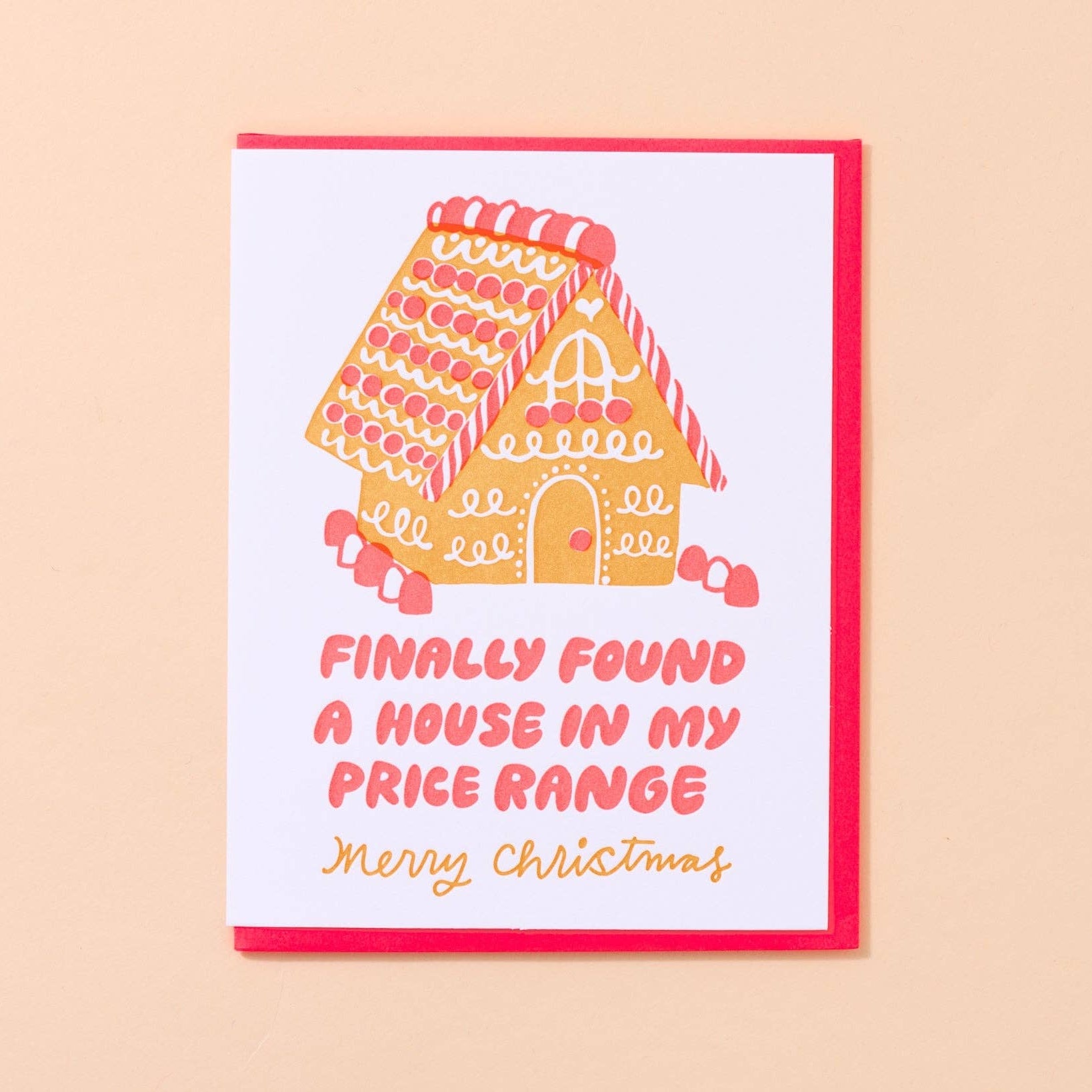 Greeting card with a gingerbread house illustration and humorous text on a beige background