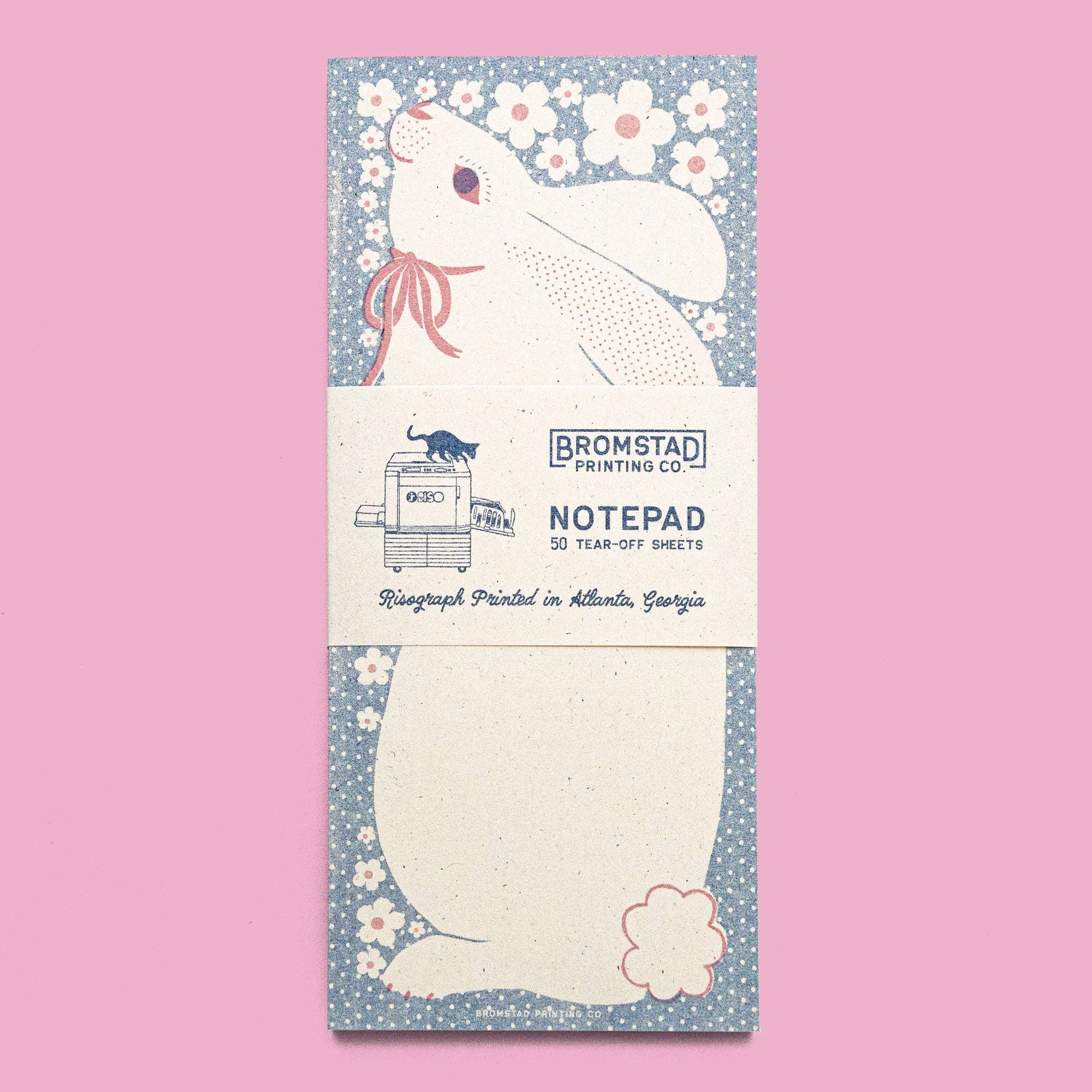 Notepad with a rabbit design on a pink background