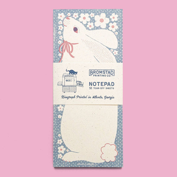 Notepad with a rabbit design on a pink background