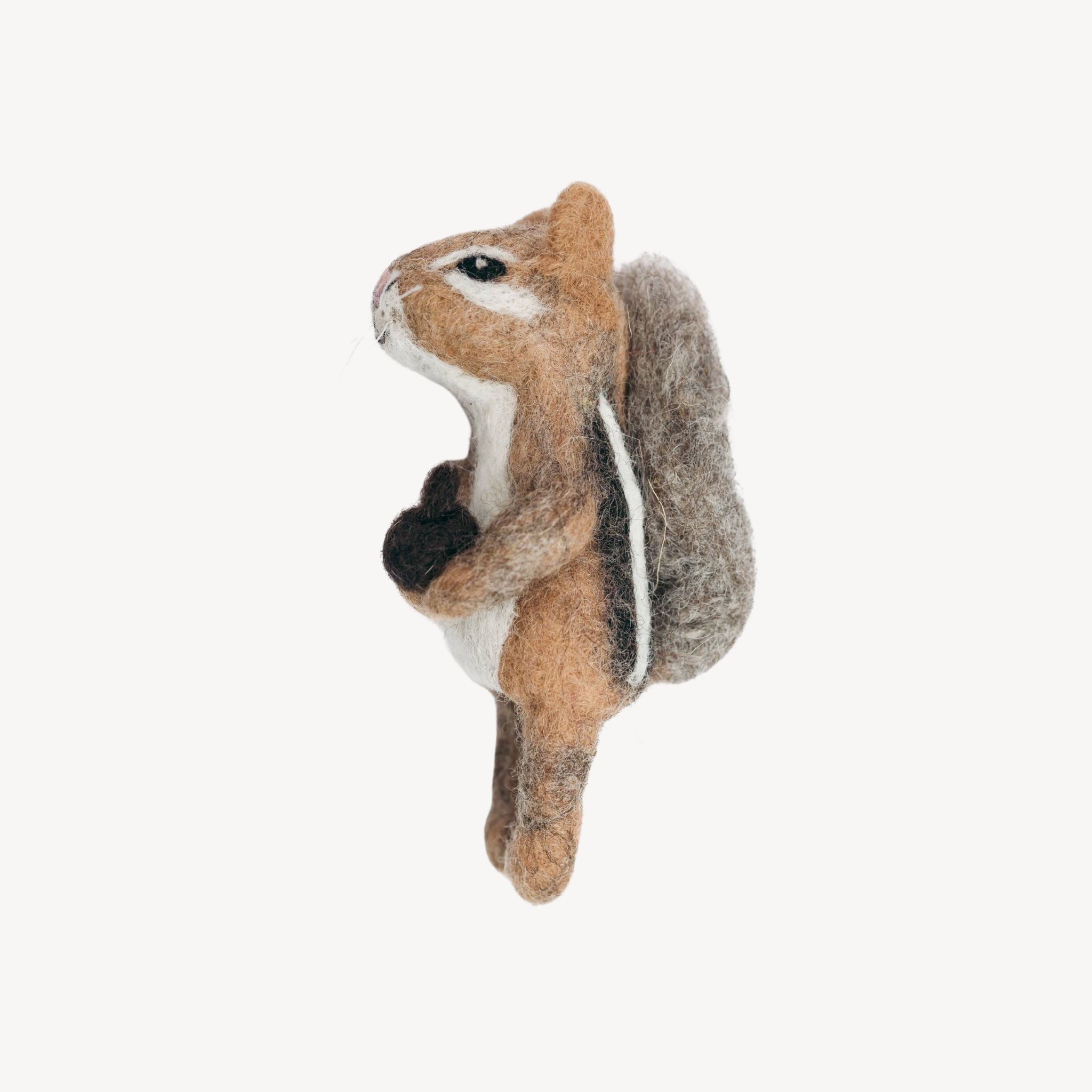 A felt chipmunk finger puppet on a against a white background.