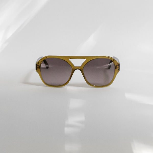 a picture of the chiyo avocado sunglasses against a white backdrop