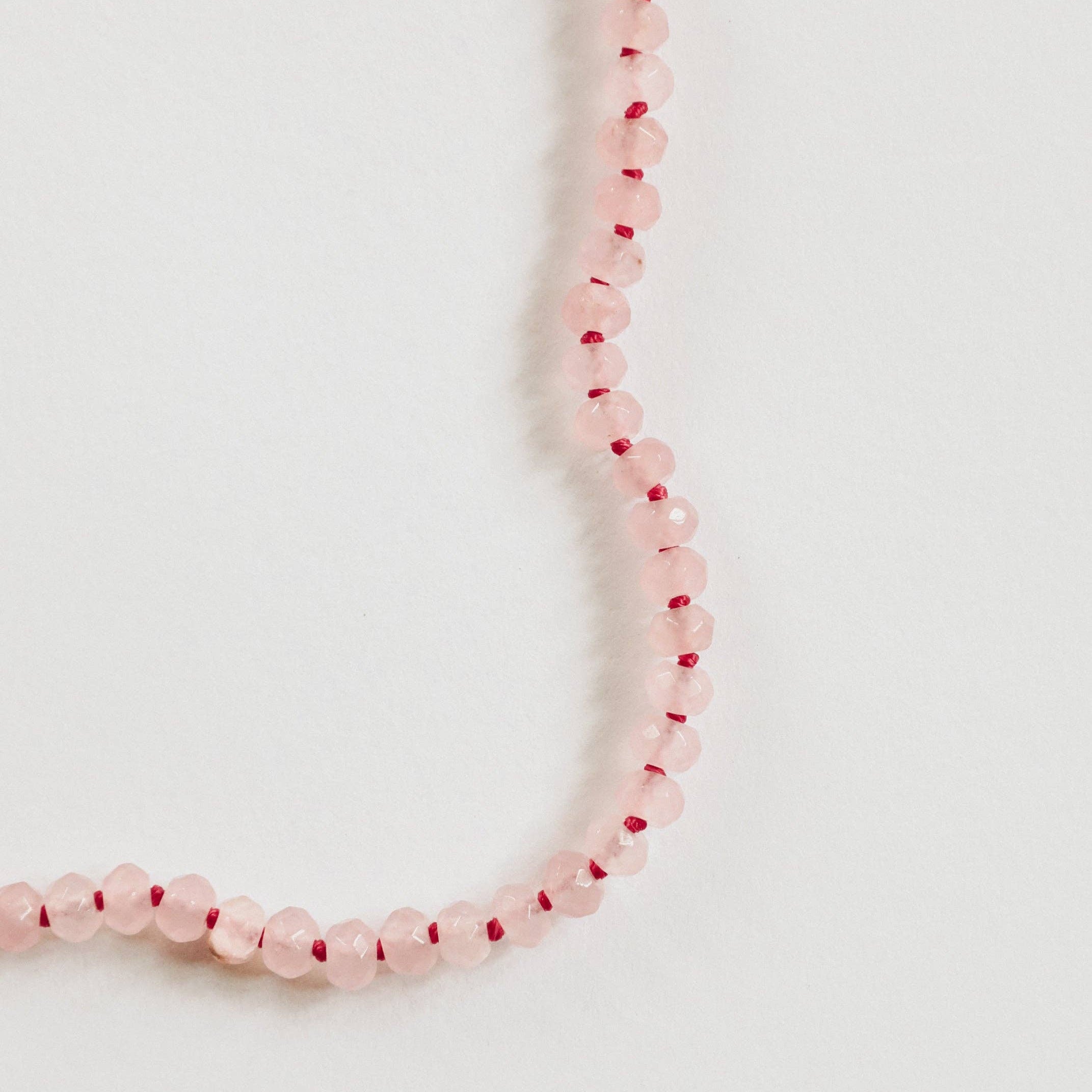 Rose Quartz gemstone necklace by CanyonLeaf set on a delicate chain, showcasing a soft pink color and elegant design.
