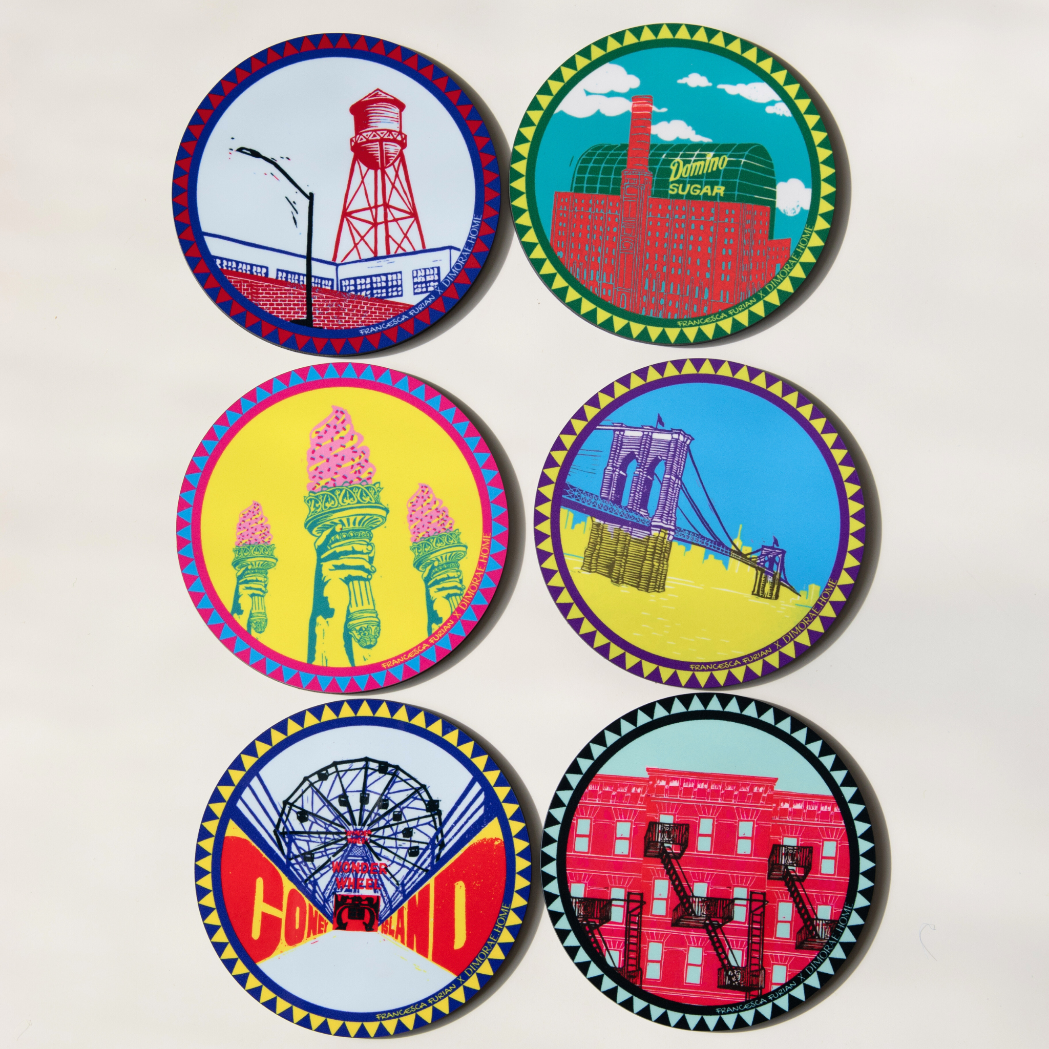 Set of Dimorae Around Brooklyn coasters featuring colorful cityscape designs. Perfect for protecting surfaces.