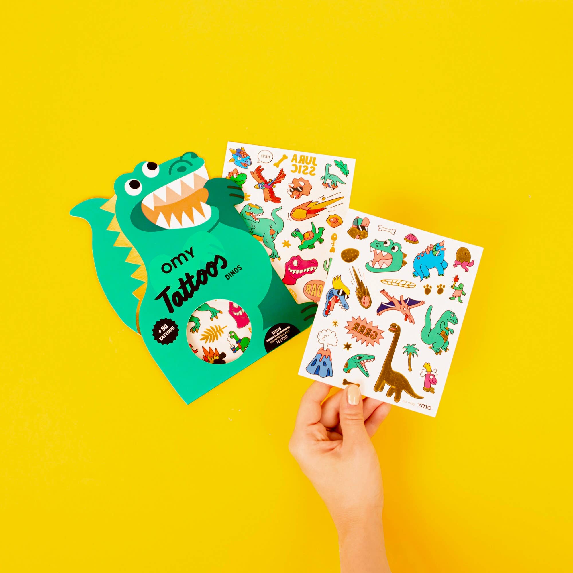 Children's tattoo book with dinosaur design on a yellow background