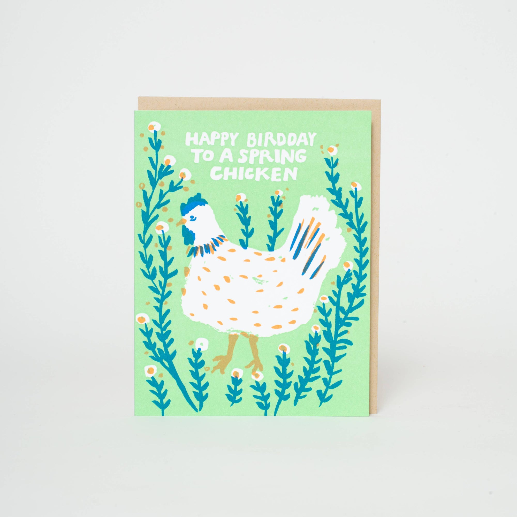 Spring Chicken greeting card by Egg Press Manufacturing featuring a colorful illustration of a cheerful spring chicken.
