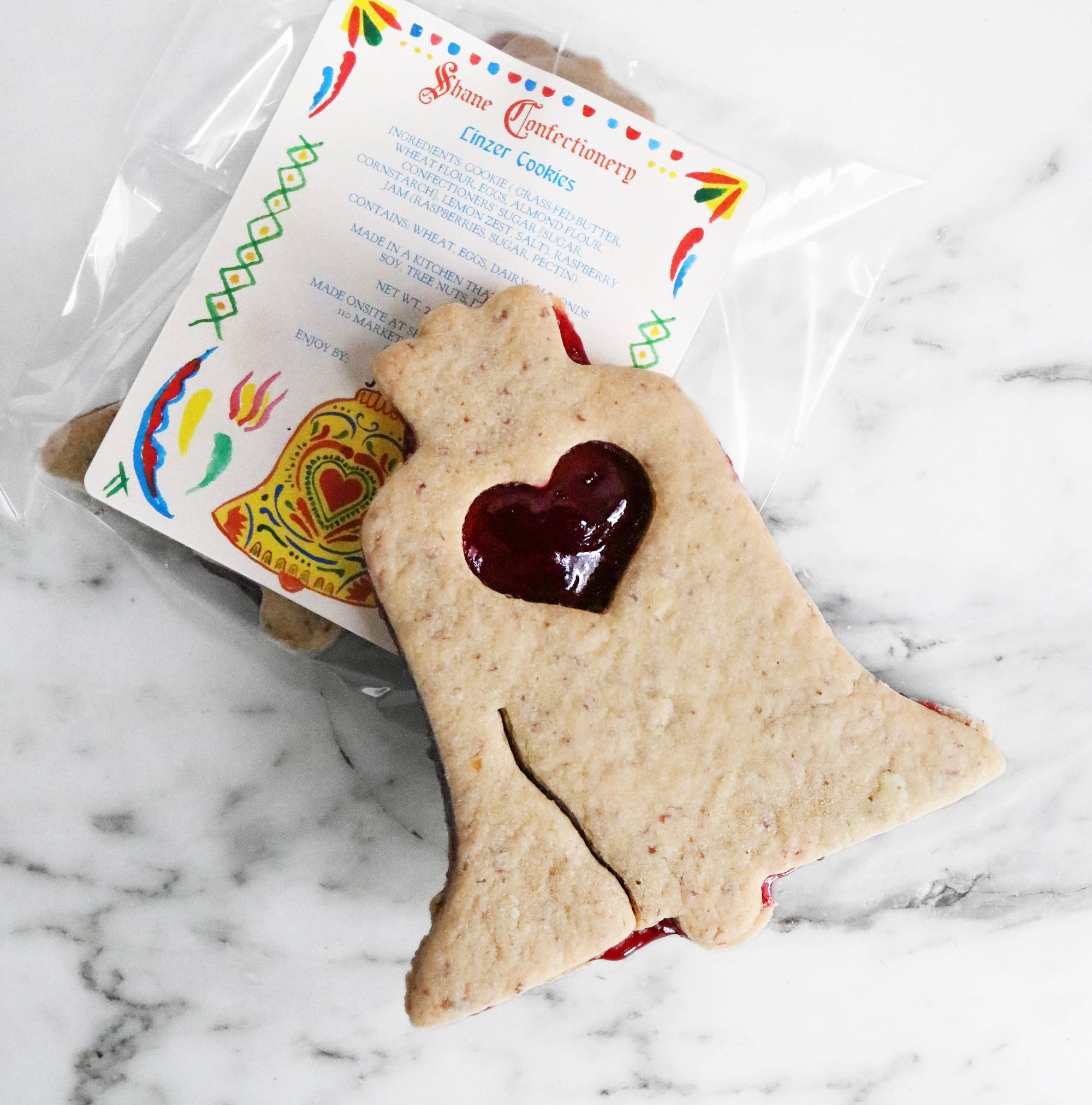 Raspberry Linzer Bell Cookie