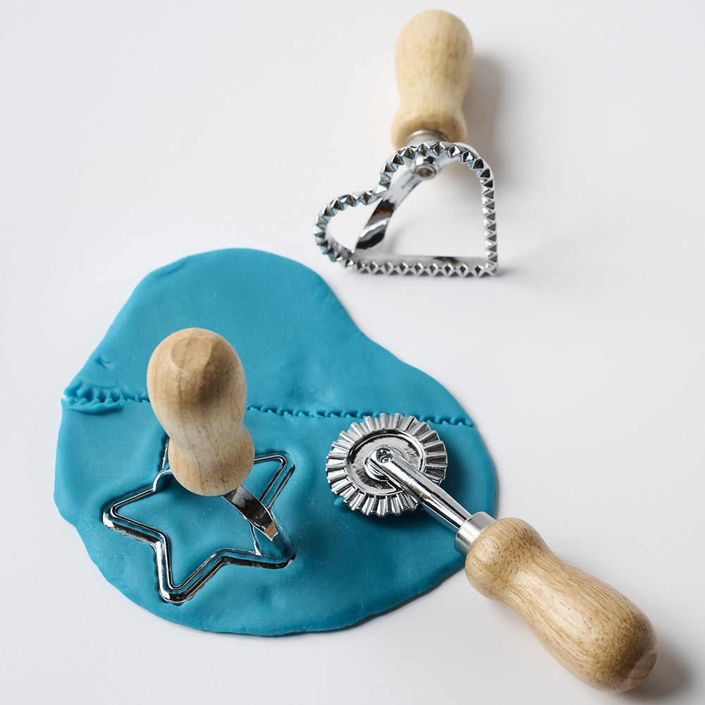 Colorful Playdough Cutter toy by Elseware Unplug, featuring various shapes for creative kids' play and craft activities.