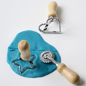 Colorful Playdough Cutter toy by Elseware Unplug, featuring various shapes for creative kids' play and craft activities.