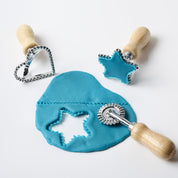 Colorful Playdough Cutter toy from Elseware Unplug, designed for children to shape and create with playdough.