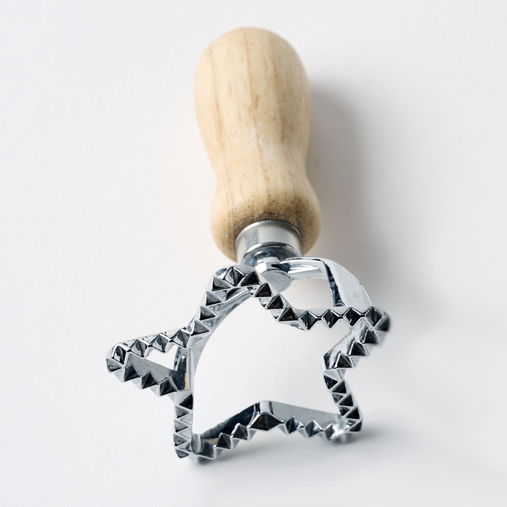 Star-shaped Playdough cutter by Elseware Unplug, a colorful plastic toy tool for creative children’s craft activities.