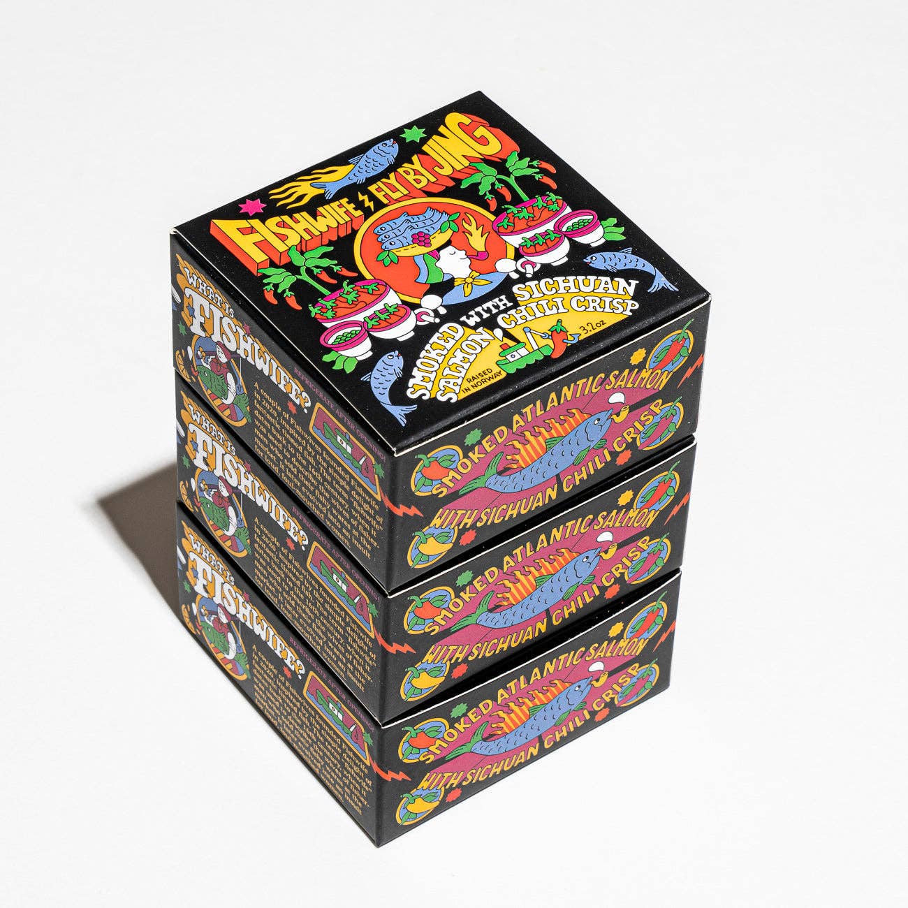 A stack of boxes with the title Fishwife Fly By Jing printed on it