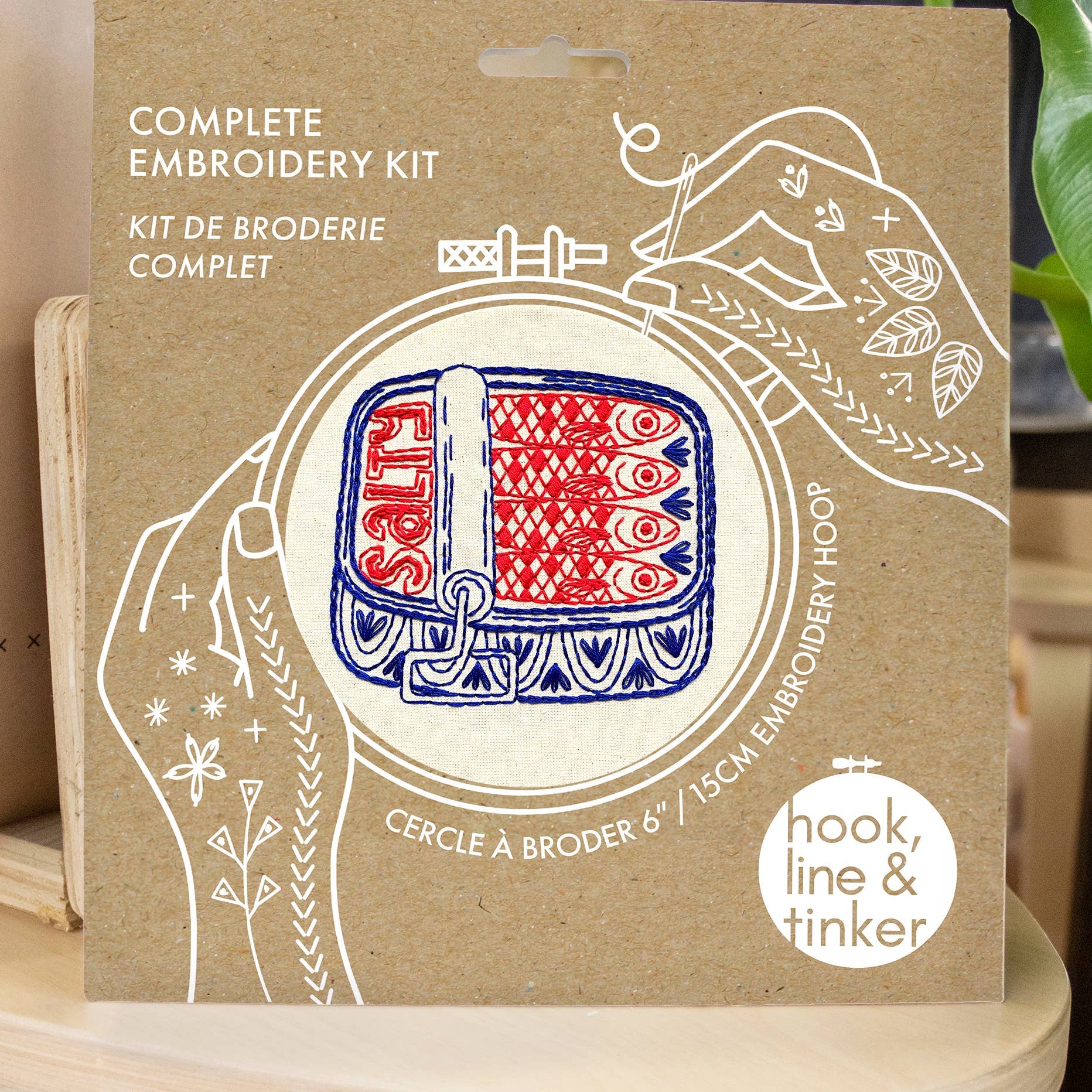 Box for a complete embroidery kit with 'hook, line & tinker' branding.