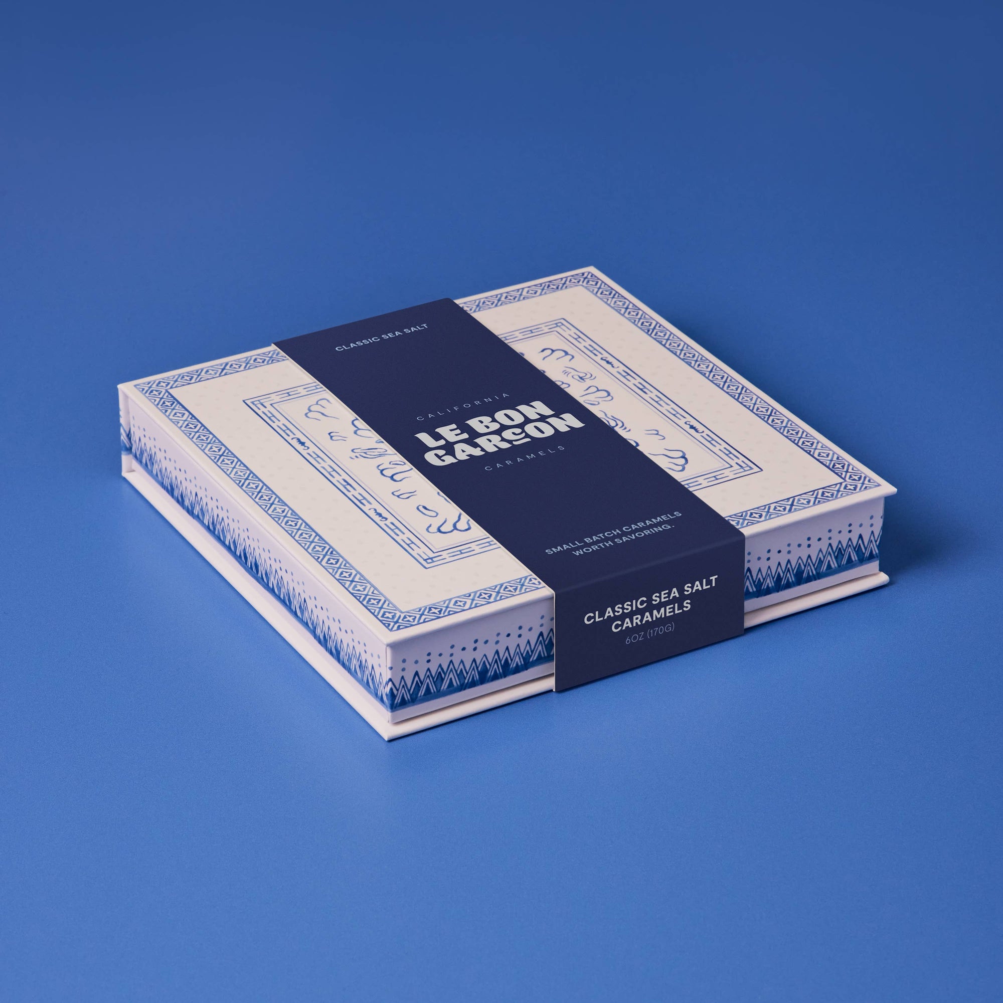 Classic Sea Salt Caramels Gift Box from Le Bon Garcon featuring assorted caramels in a decorative box.