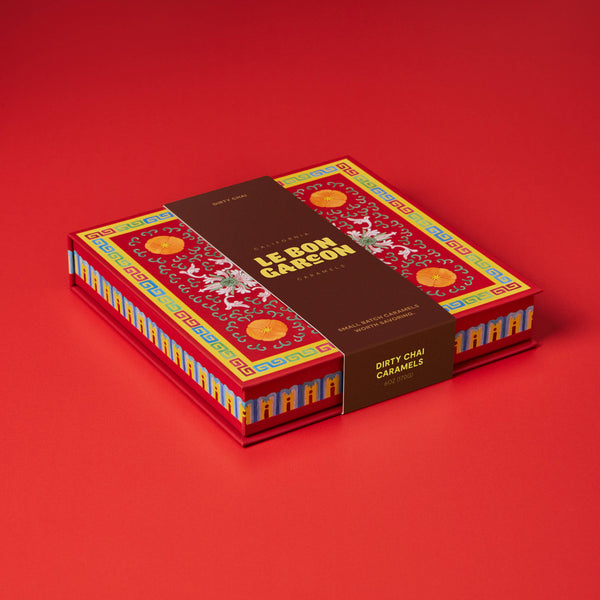 Le Bon Garcon Dirty Chai Caramels Gift Box featuring assorted caramel candies with chai spice flavoring.