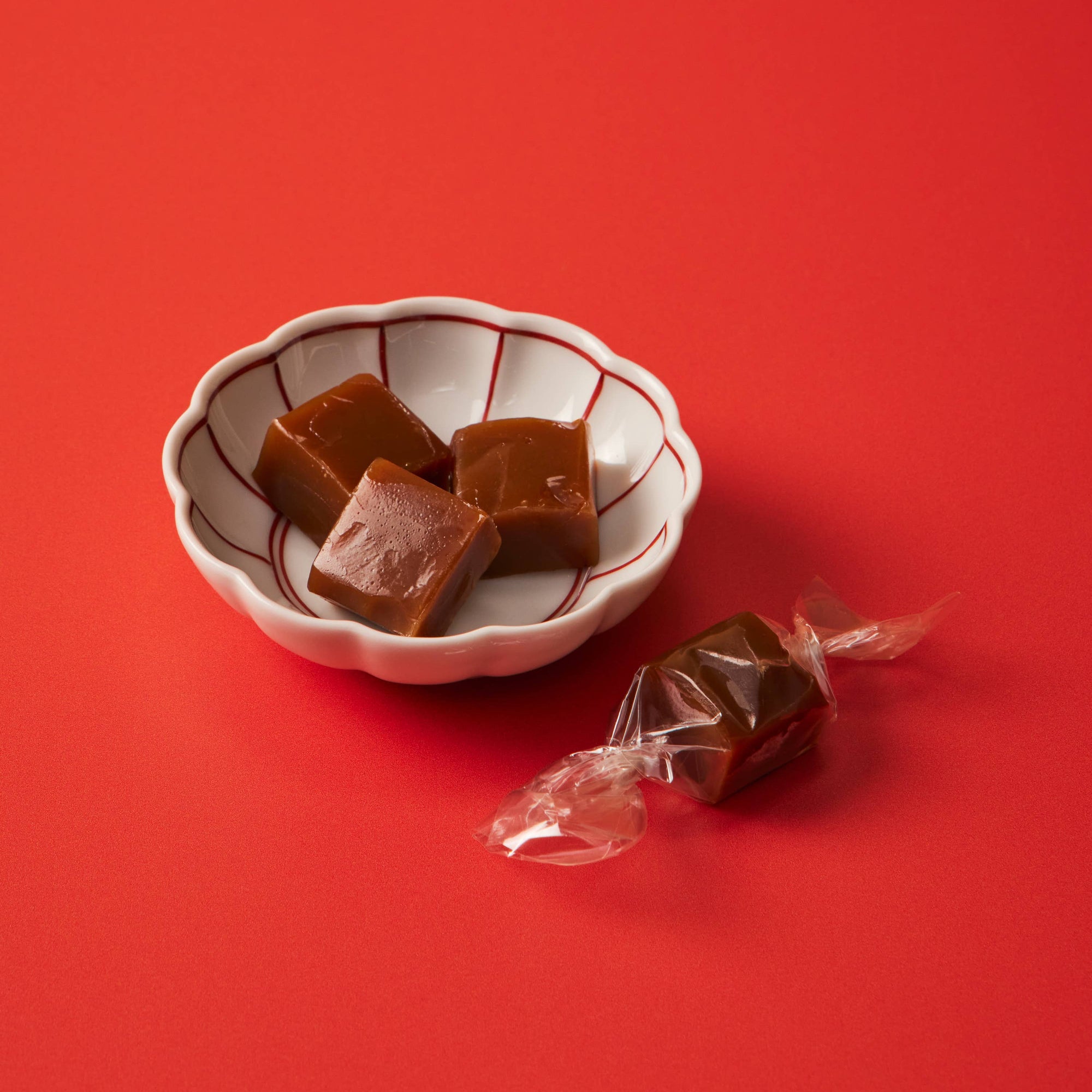 Le Bon Garcon Dirty Chai Caramels gift box featuring rich caramel candies infused with chai spices.