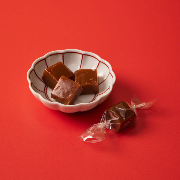 Le Bon Garcon Dirty Chai Caramels gift box featuring rich caramel candies infused with chai spices.