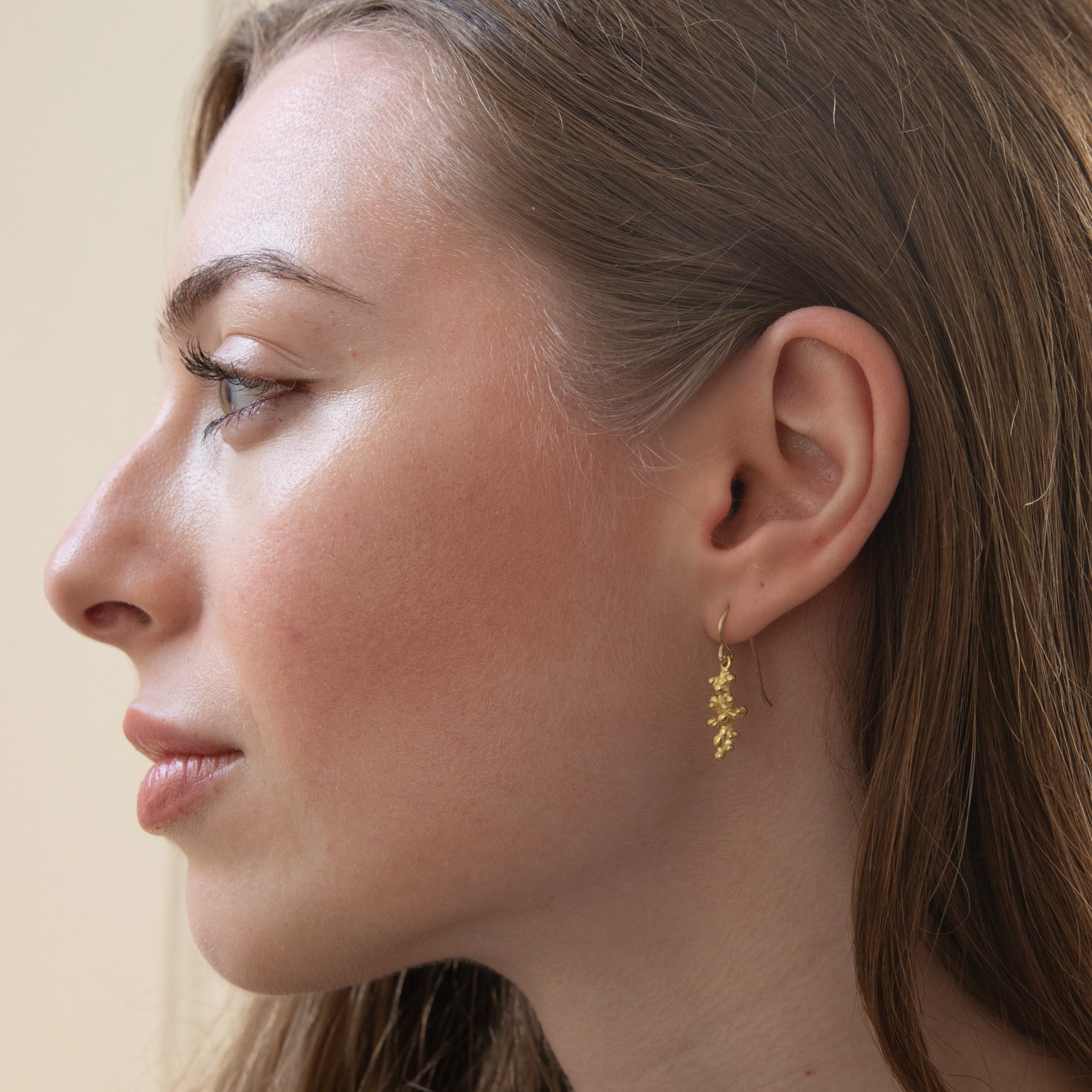 Gold Budding Twigs Earrings by Lisa Medoff Designs showcasing intricate twig-like details and elegant craftsmanship.