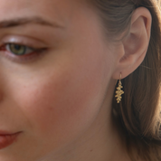 Gold Budding Twigs Earrings by Lisa Medoff Designs featuring intricate twig-inspired design and elegant shape.