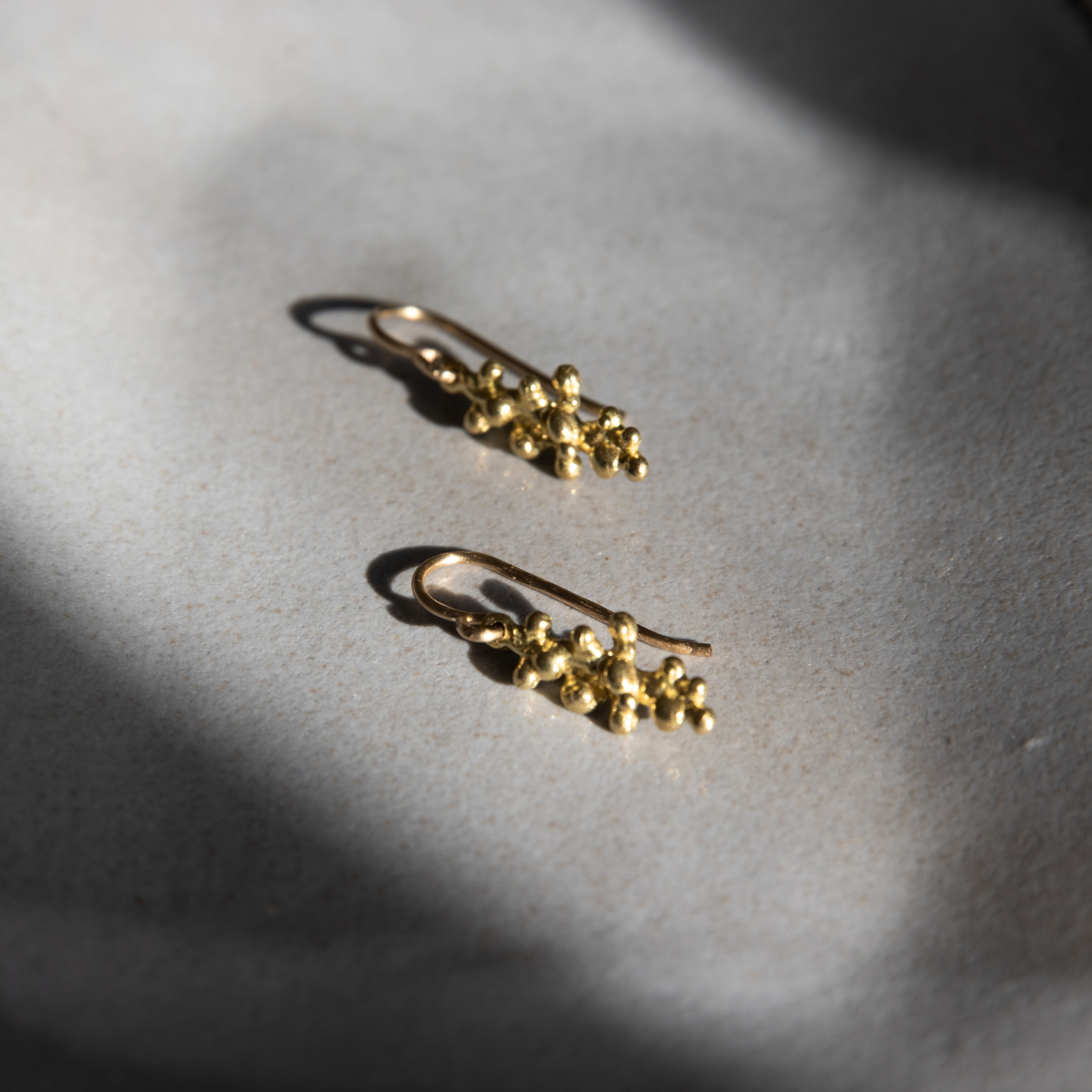 Gold Budding Twigs Earrings by Lisa Medoff Designs featuring delicate twig-inspired design and intricate detailing.