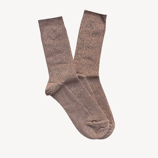 A pair of brown glitter socks against a plain background.