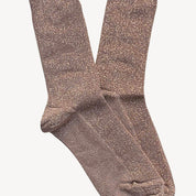 A pair of brown glitter socks against a plain background.