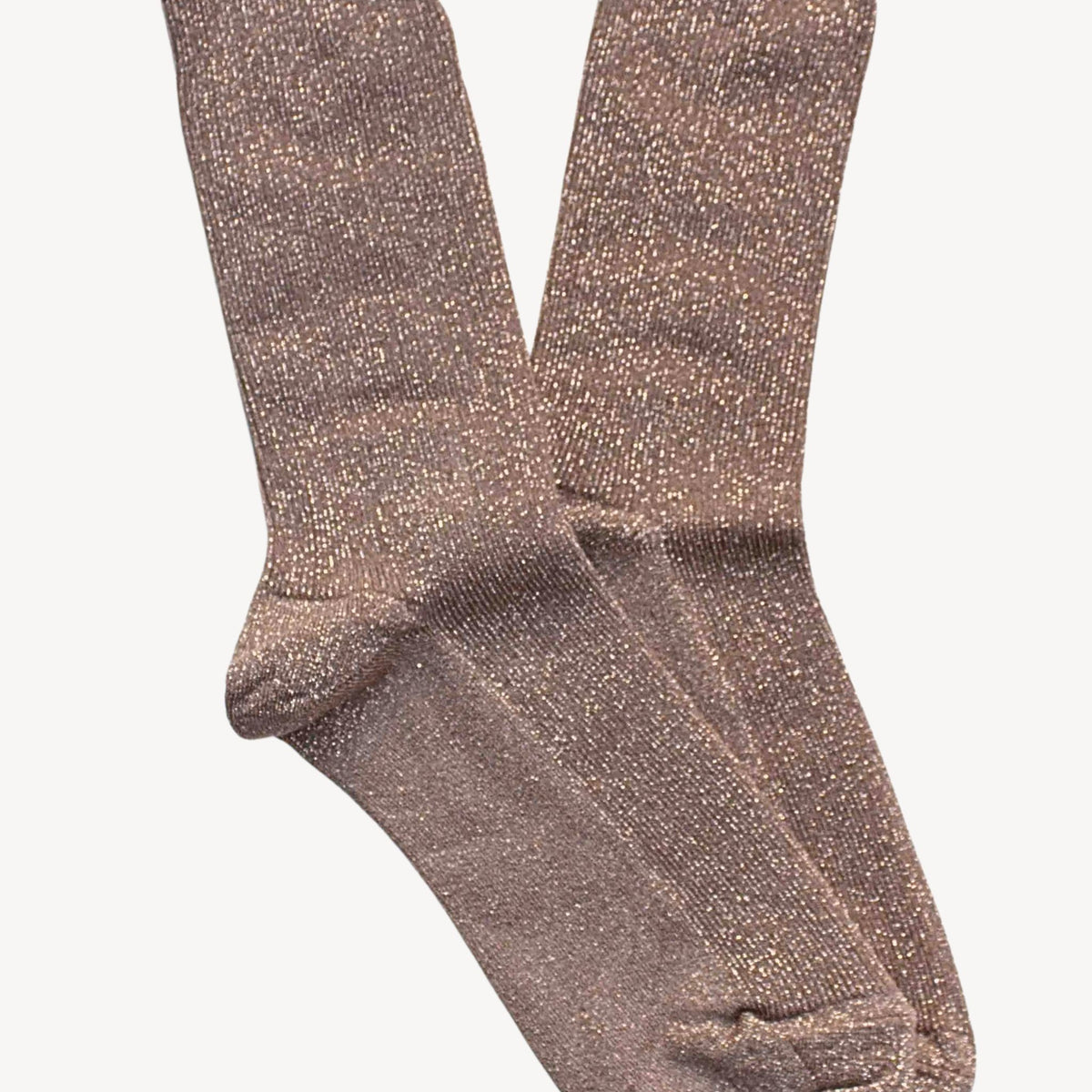 A pair of brown glitter socks against a plain background.