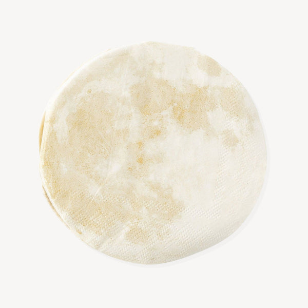Moon-shaped cut out napkin against a white background.