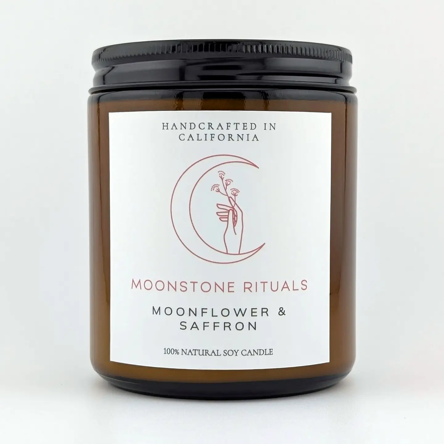 Candle jar with a label on a white background