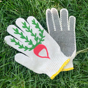 Gardening glove with a radish design on grass