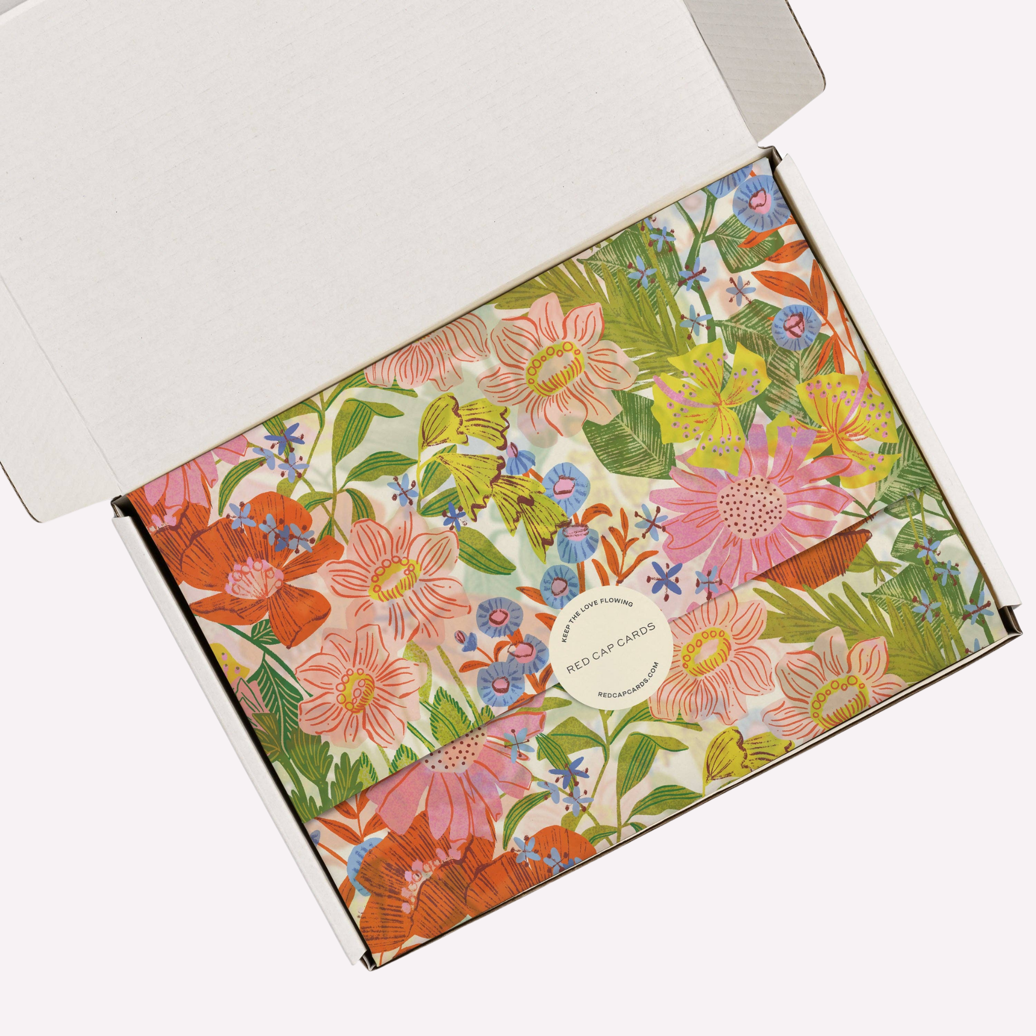 Red Cap Cards Our Love Grows Tissue Paper featuring colorful floral patterns and delicate, lightweight tissue material.