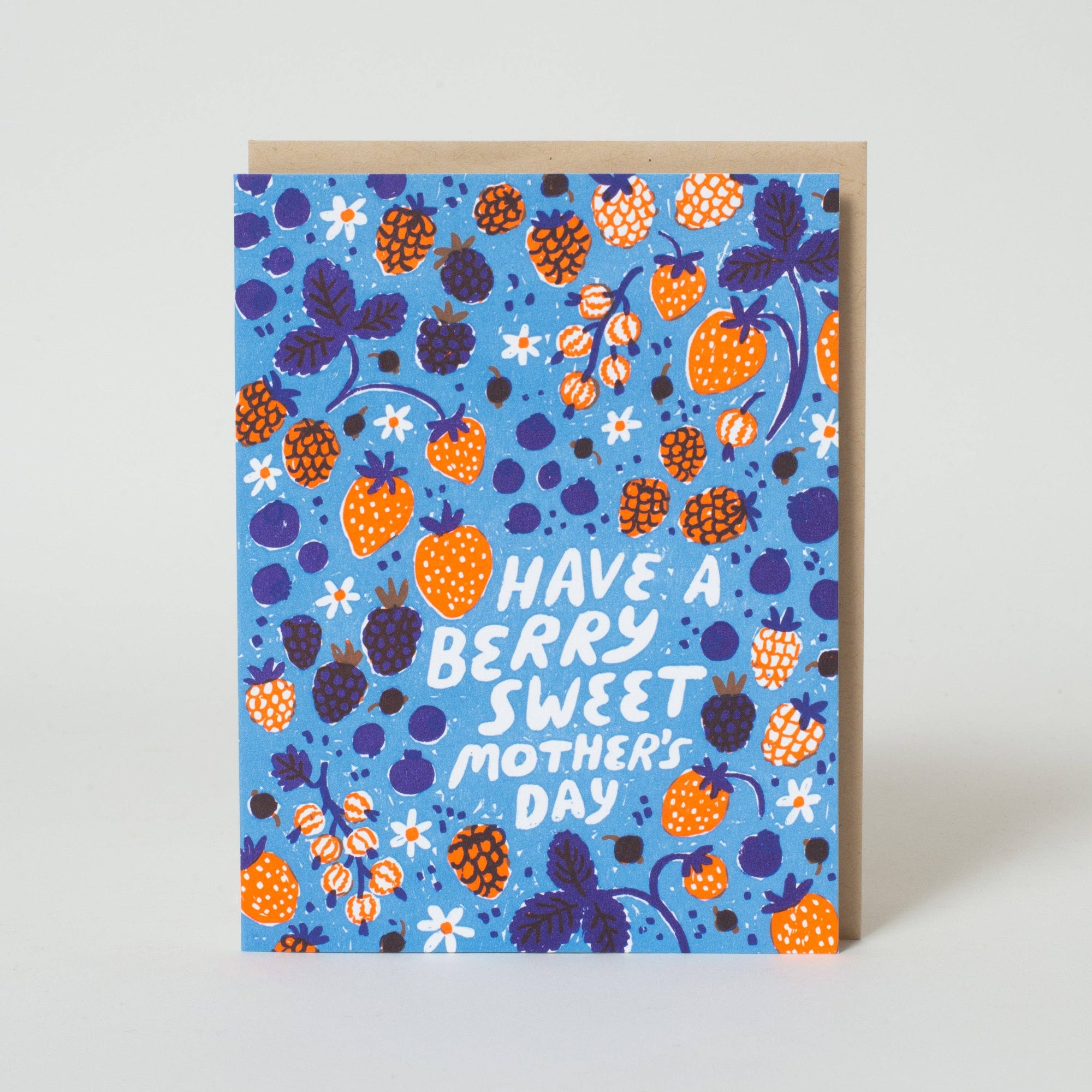 Greeting card with berry pattern and 'Have a berry sweet Mother's Day' text on a blue background.