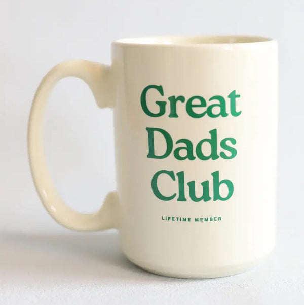Mug with 'Great Dads Club' text on a light gray background