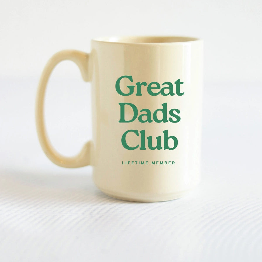 Beige mug with 'Great Dads Club Lifetime Member' text on a white background